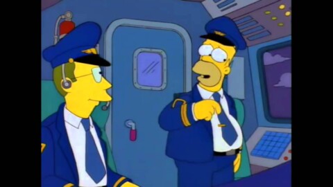 Homero Simpson vuela un avion